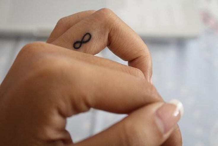 small-infinity-tattoo-on-finger