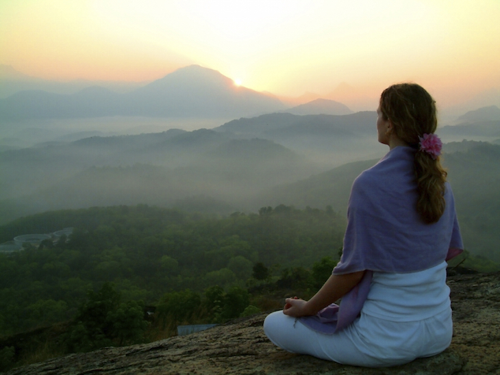 topMeditation-ebooks-woman-meditating-peacefully