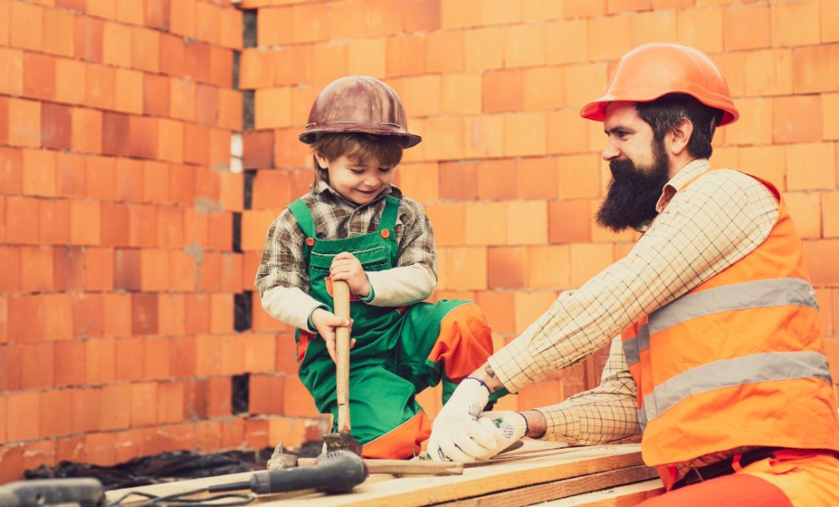 A man and a boy expanding the room.