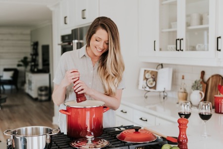 Woman cooking food in the kitchen.