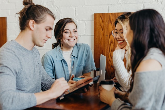 A group of people discussing about business ideas.