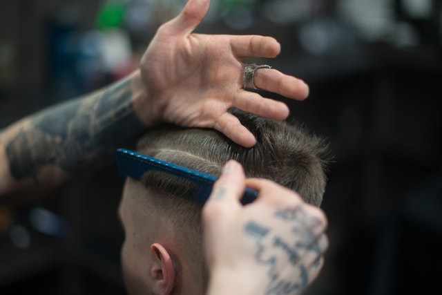 Man getting treated for his scalp.