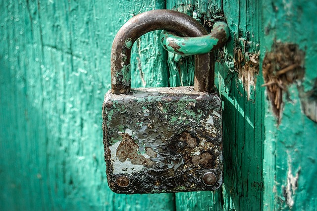 An old lock used for the security of the door.