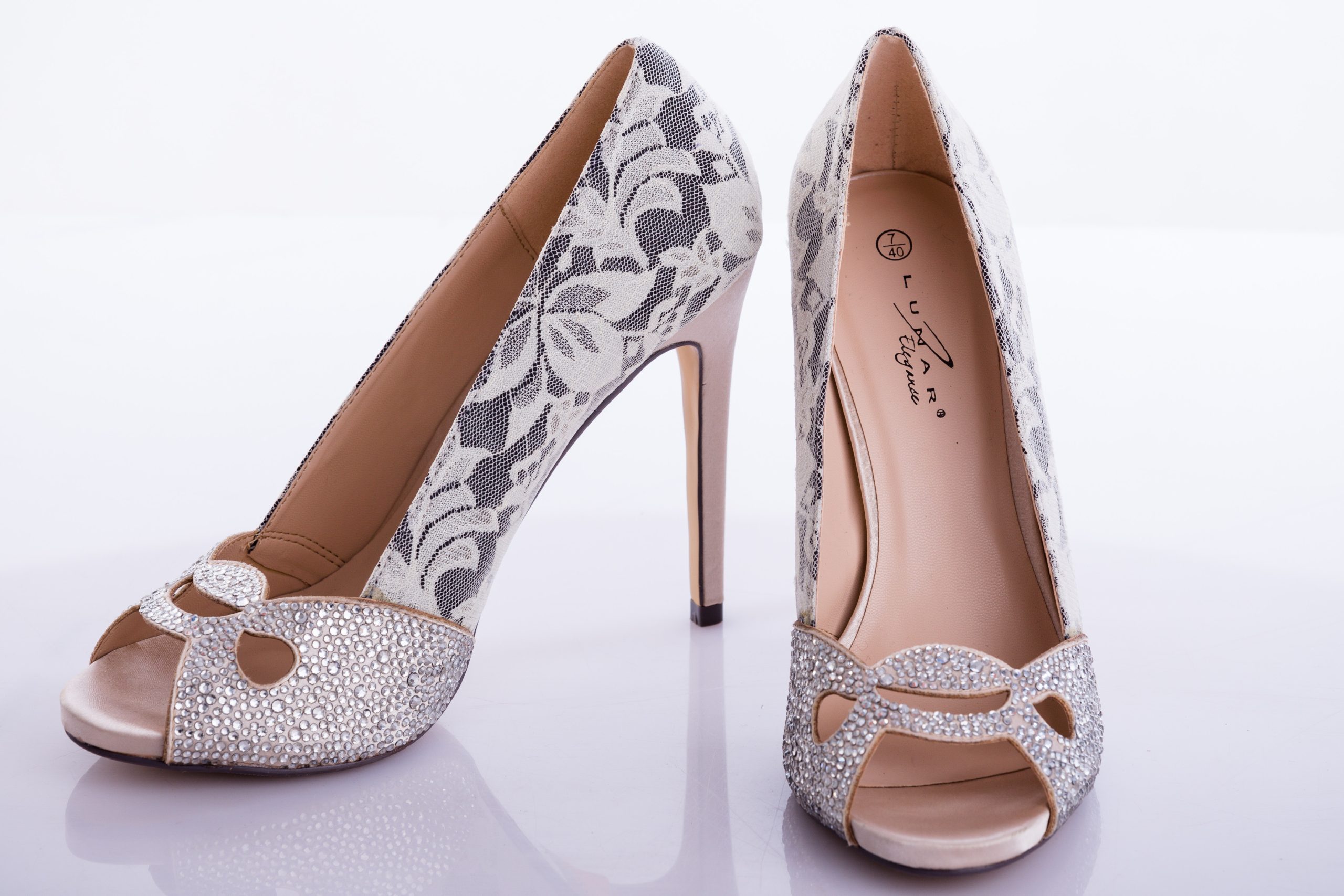A pair of beautiful diamond studded italian shoes.