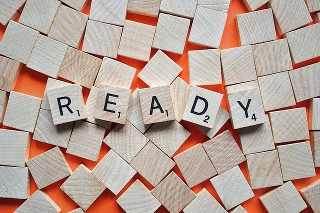 The word ready with wooden blocks telling to be ready for whatever might come your way.