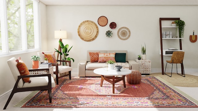 A living room with sofa, chairs and other decor.