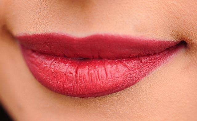Beautiful lips with lipstick.