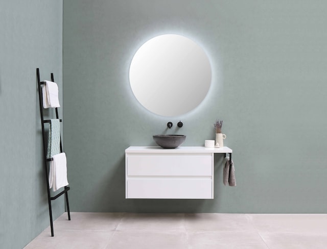 A towel stand, a mirror and a basin.