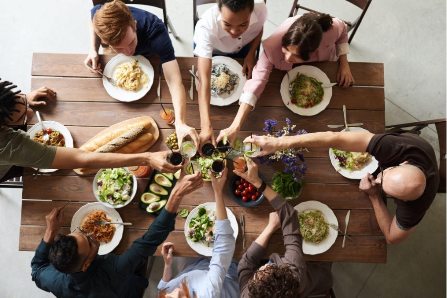 A group of people having dinner together.