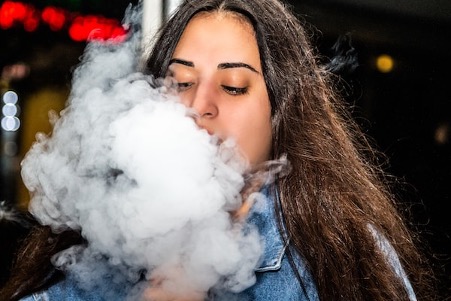 A woman smoking.