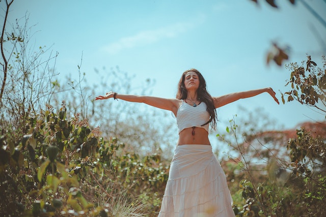 A woman stretching her hands.